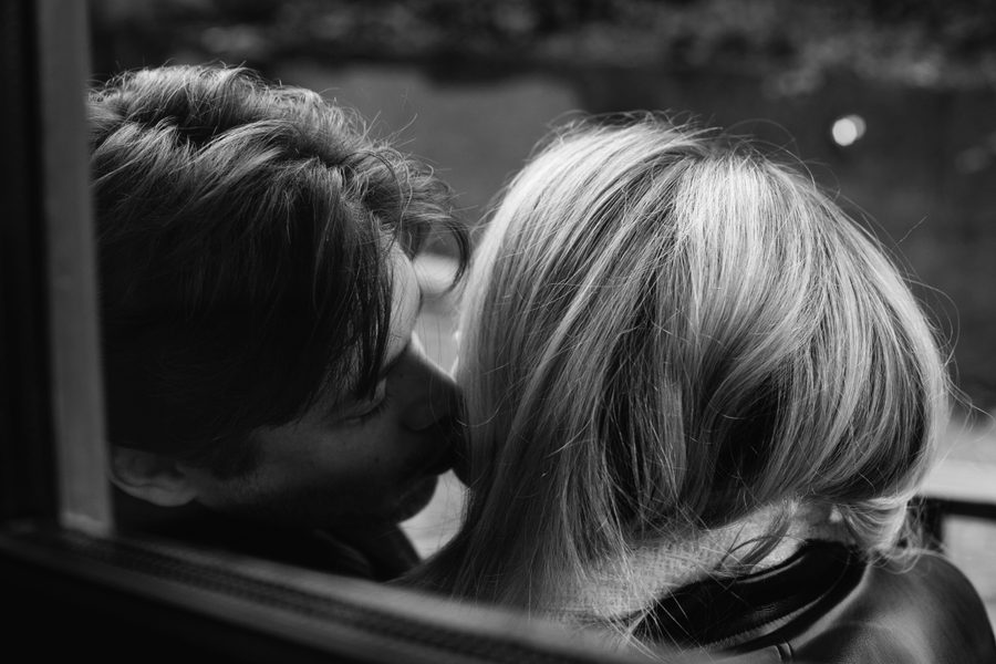 Tender moment between partners in soft afternoon light