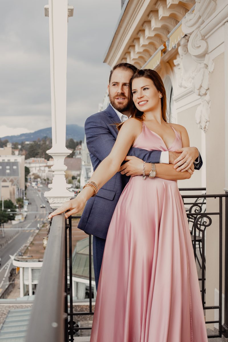 Editorial couple portrait with Lake Geneva in the background