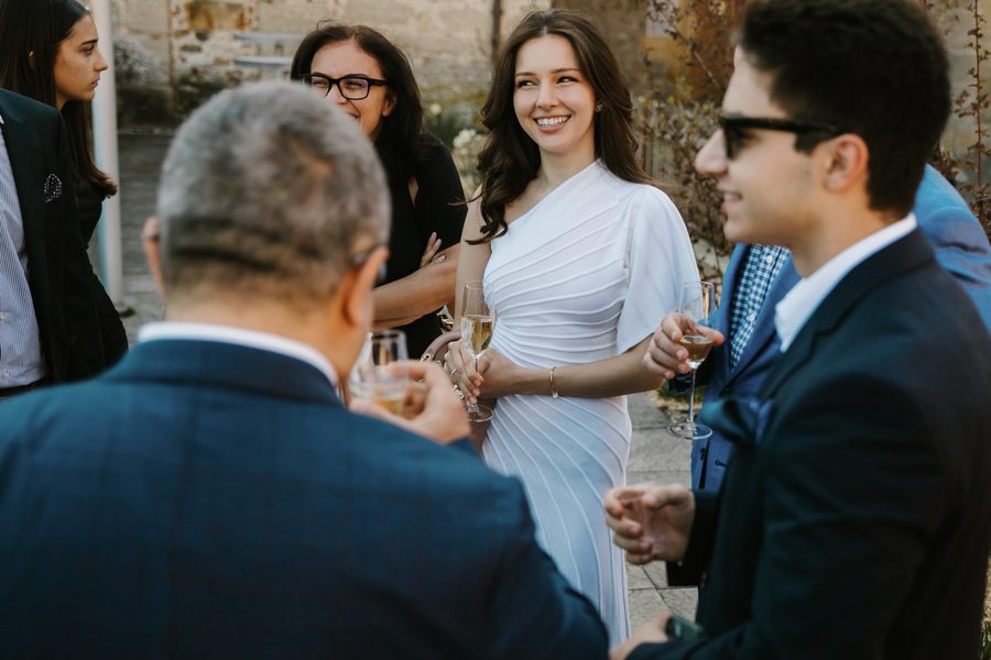 Guest interactions during a refined cocktail event in Lausanne
